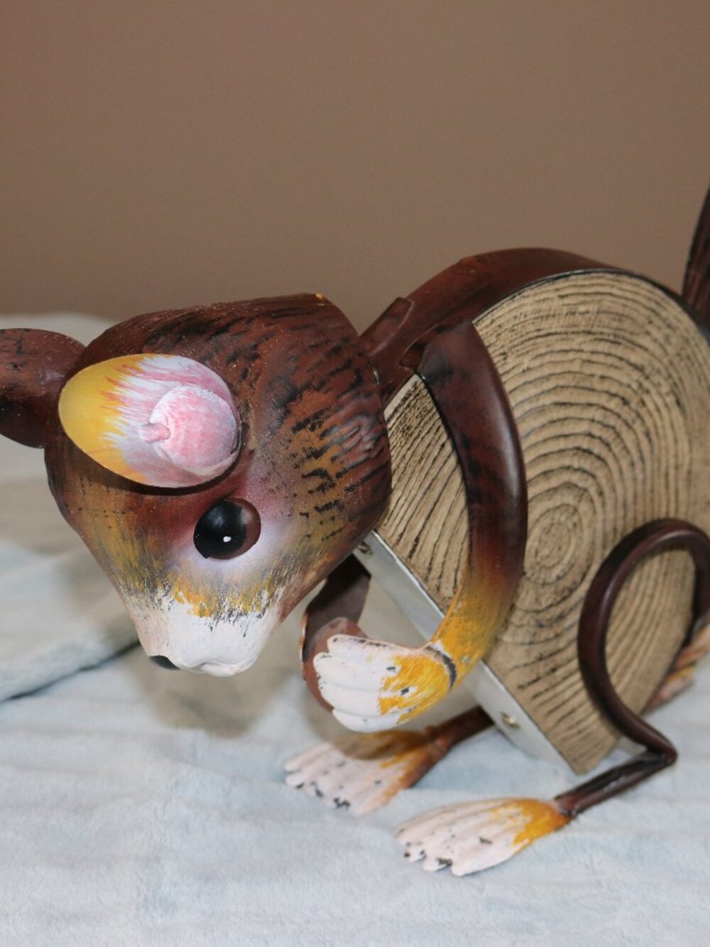 Metal handpainted table top squirrel.